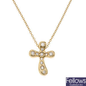 TIFFANY & CO. - a diamond cross pendant, by Elsa Peretti.