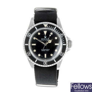ROLEX - a gentleman's stainless steel Oyster Perpetual Submariner wrist watch.