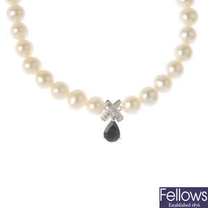 A selection of four cultured pearl necklaces.