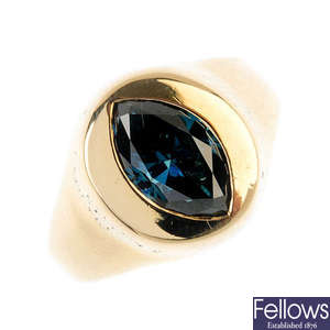 A colour-treated 'blue' diamond signet ring.