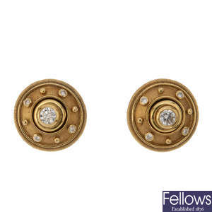 CASSANDRA GOAD - a pair of 18ct gold diamond interchangeable ear studs.