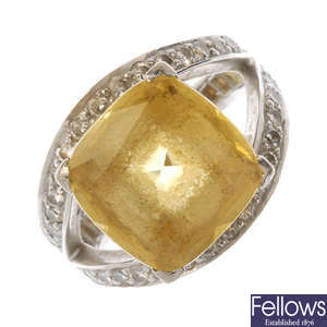 CASSANDRA GOAD - an 18ct gold heliodor and diamond dress ring.