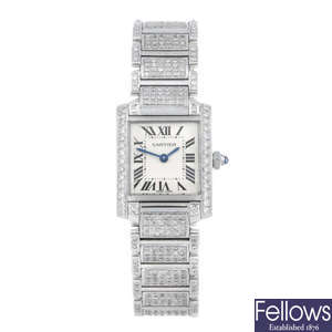 CARTIER - a diamond set stainless steel Tank Francaise bracelet watch.