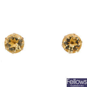 Nineteen pairs of gem-set earrings.
