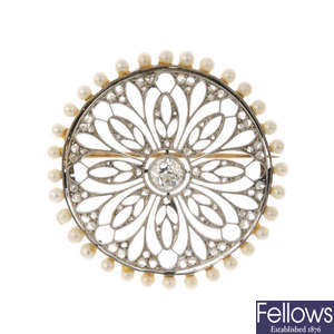 An early 20th century platinum, diamond and seed pearl brooch.
