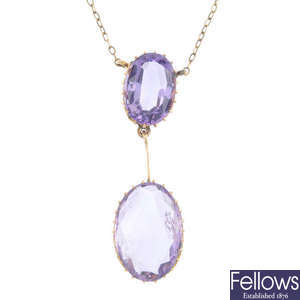 An early 20th century gold amethyst two-stone necklace.