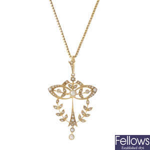 An early 20th century 15ct gold diamond and split pearl pendant, with chain.