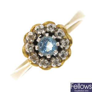 A mid 20th century 18ct gold topaz and diamond cluster ring.