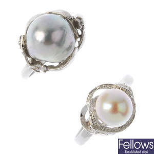 Two cultured pearl rings.