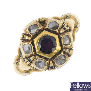 A mid 19th century garnet and diamond cluster ring.