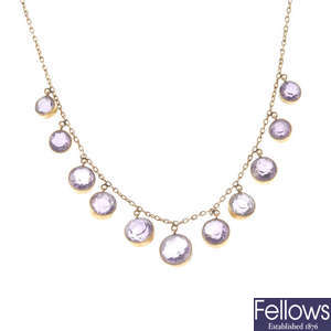An early 20th century 9ct gold amethyst fringe necklace.