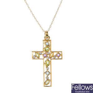 A 14ct gold multi gem-set bracelet and a 9ct gold diamond and multi-gem cross pendant, with chain.