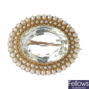A late 19th century 15ct gold aquamarine and split pearl brooch.