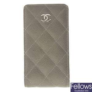 CHANEL - a phone case.