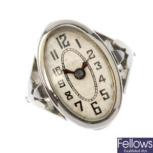 An Art Deco 18ct gold watch ring.