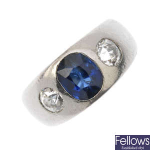 A gentleman's sapphire and diamond three-stone ring.