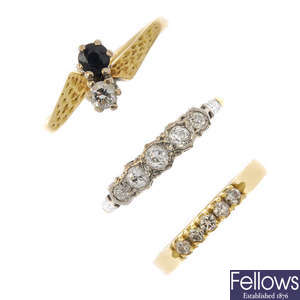 A selection of three diamond rings.