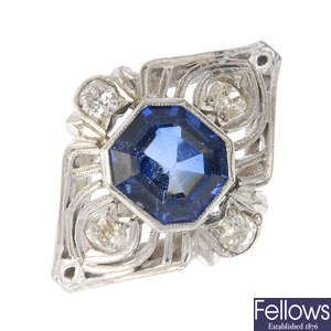 An early 20th century platinum and 18ct gold sapphire and diamond dress ring.