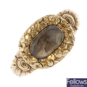 A mid 19th century gold woven hair memorial ring.