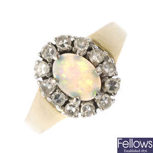 An 18ct gold opal and diamond cluster ring.