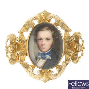 A mid 19th century gold portrait miniature clasp.