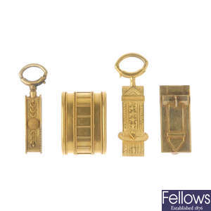 A selection of four late 19th century gold clasps and sliders.