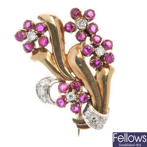 A mid 20th century diamond and ruby brooch.