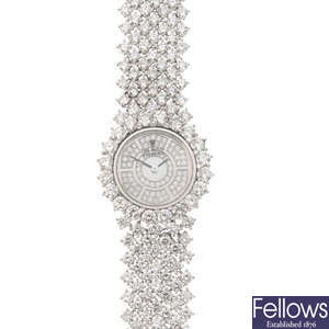 A ladies diamond wrist watch.