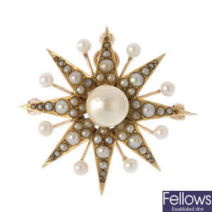 An early 20th century gold pearl star brooch.