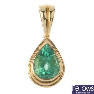 An emerald pendant.