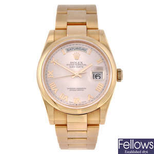 CURRENT MODEL: ROLEX - a gentleman's 18ct Everose gold Oyster Perpetual Day-Date 36 bracelet watch.