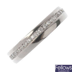 A palladium diamond full-circle eternity ring.