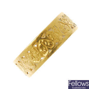 A mid 20th century 22ct gold foliate band ring.