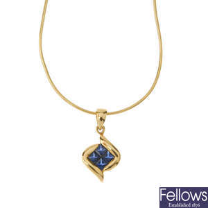 An 18ct gold sapphire pendant, with chain.
