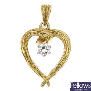An 18ct gold diamond single-stone heart pendant. 