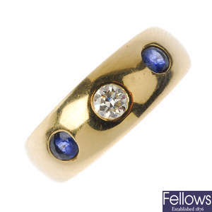 A diamond and sapphire band ring.