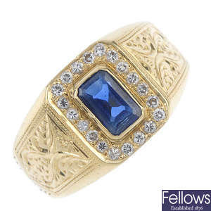 A gentleman's sapphire and diamond dress ring.