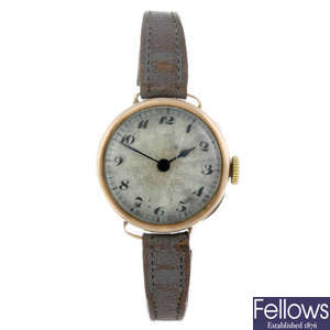 ROLEX - a lady's 9ct gold wrist watch.