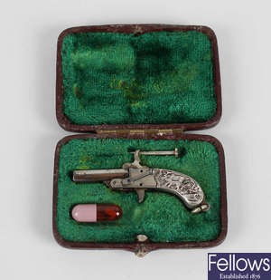 A late 19th century Franz Pfannl Boar Grip Breloque pinfire pistol.
