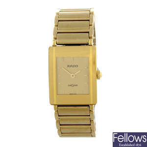 RADO - a lady's gold plated bracelet watch.