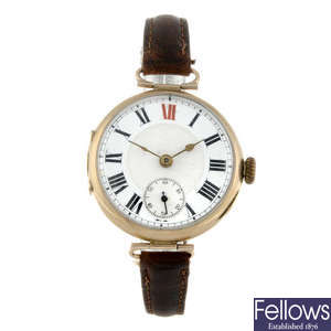 A gentleman's 9ct yellow gold trench wrist watch.
