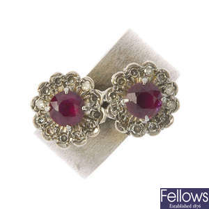A ruby and diamond double cluster ring.