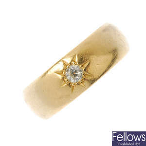 An early 20th century 18ct gold diamond band ring.