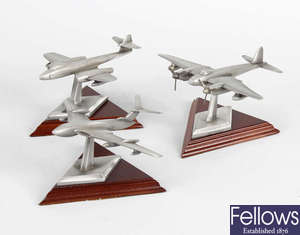 Twenty six 'English Miniatures' and Royal Hampshire Art Foundry cast metal, model aeroplanes, jets and helicopters.