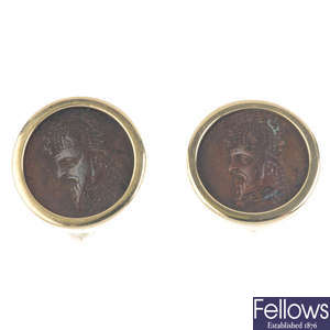 A pair of token earrings.