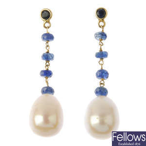 A pair of freshwater cultured pearl and sapphire earrings.