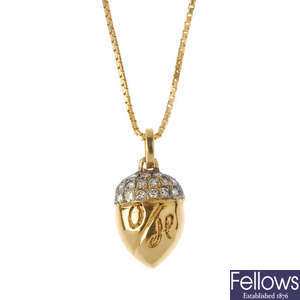A diamond acorn pendant, with chain.