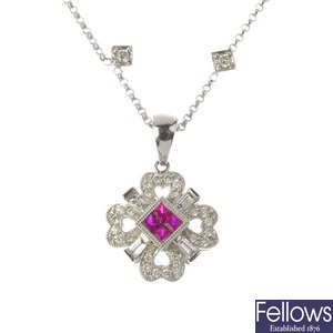 A ruby and diamond cluster pendant, on chain.