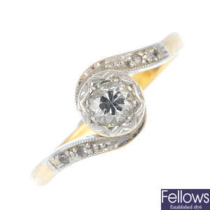 A mid 20th century 18ct gold diamond single-stone crossover ring.