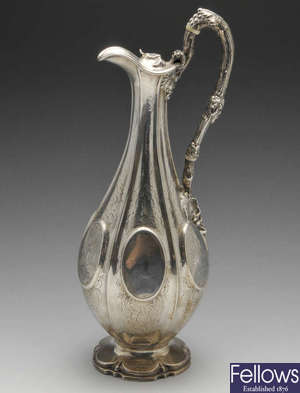 A Victorian silver ewer.
